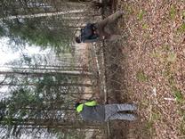 Two students clearing the trails